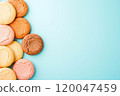 Mixed-flavor cookies on a pastel background with a copy space.  120047459