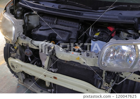 A light vehicle being repaired A light vehicle being repaired 120047625