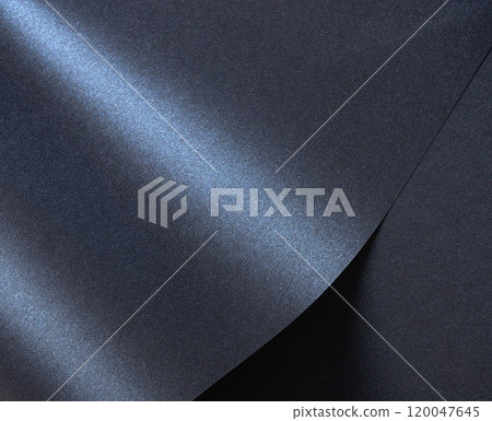 Luxurious designer paper background in deep navy blue with a glossy, satin finish and rich gradient. Luxurious designer paper background in deep navy blue with a glossy, satin finish and rich gradient. 120047645