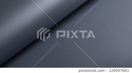 Glossy designer paper background with a metallic slate gray gradient, featuring wavy, curved 120047663