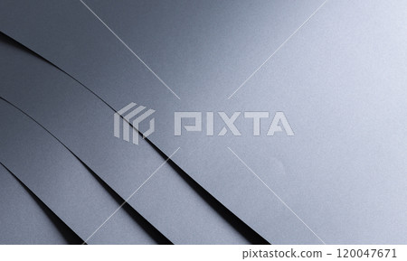 Fine textured designer paper background with a smooth, metallic gradient in monochrome gray. This 120047671