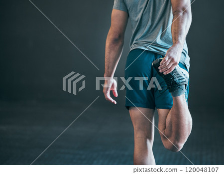 Stretching, fitness and legs of man in gym for exercise, training and warm up for workout on gray background. Mockup space, sports and person with muscle for wellness, performance and flexibility 120048107