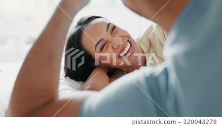 Happy couple, laughing and morning with bed in relax for bonding, love or support together at home. Young man and woman with smile and enjoying weekend, holiday or funny humor in bedroom at house Happy couple, laughing and morning with bed in relax for bonding, love or support together at home. Young man and woman with smile and enjoying weekend, holiday or funny humor in bedroom at house 120048278