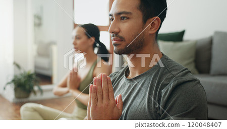 Couple, man and namaste with meditation on floor for holistic wellness, mindfulness and relax in home with zen. People, praying hands and spiritual healing in living room for yoga, pilates or bonding Couple, man and namaste with meditation on floor for holistic wellness, mindfulness and relax in home with zen. People, praying hands and spiritual healing in living room for yoga, pilates or bonding 120048407