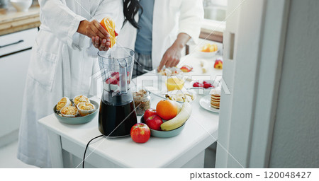 Couple, breakfast and blender for smoothie in kitchen for vitamin nutrition, morning routine or healthy protein shake. People, hands and organic detox for weight loss, vegan drink or wellness in home Couple, breakfast and blender for smoothie in kitchen for vitamin nutrition, morning routine or healthy protein shake. People, hands and organic detox for weight loss, vegan drink or wellness in home 120048427