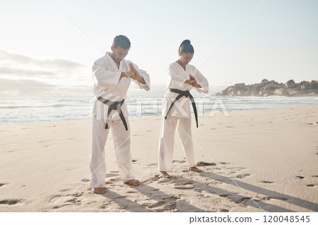 Beach, karate and couple with training, bow and fitness with martial arts, uniform and practice. Motivation, outdoor and ocean with man, wellness and respect with exercise, honor and balance Beach, karate and couple with training, bow and fitness with martial arts, uniform and practice. Motivation, outdoor and ocean with man, wellness and respect with exercise, honor and balance 120048545