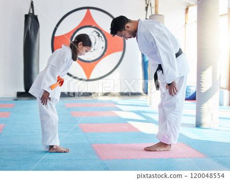 Child, master or bow in dojo for martial arts, training or exercise to prepare for karate education. Respect, warrior or judo teacher with girl kid in studio ready for taekwondo practice or workout Child, master or bow in dojo for martial arts, training or exercise to prepare for karate education. Respect, warrior or judo teacher with girl kid in studio ready for taekwondo practice or workout 120048554