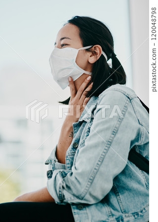 Woman, throat and face mask in clinic or covid, healthcare and waiting room or checkup. Symptoms, pain and illness for health wellness, pandemic and irritation or laryngitis, vocal strain and patient Woman, throat and face mask in clinic or covid, healthcare and waiting room or checkup. Symptoms, pain and illness for health wellness, pandemic and irritation or laryngitis, vocal strain and patient 120048798
