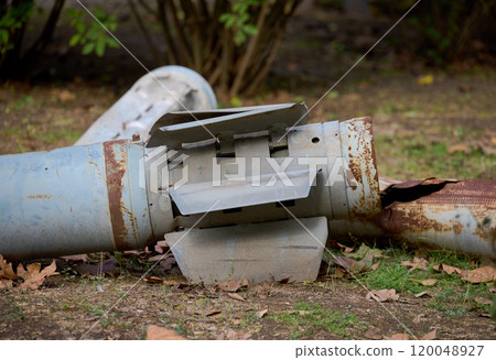 The tail section of a 220 mm rocket for the Uragan rocket fire system on a city flowerbed in Mykolaiv 120048927
