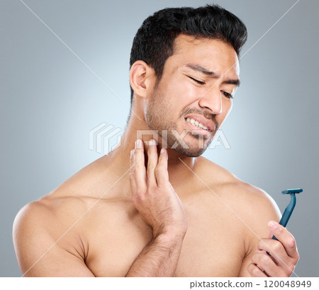 Model, face and neck shaving injury with self care grooming, health or beard mistake. Pain, man and hair removal accident with cleaning, facial treatment and razor on gray studio background Model, face and neck shaving injury with self care grooming, health or beard mistake. Pain, man and hair removal accident with cleaning, facial treatment and razor on gray studio background 120048949