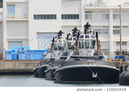 Anchored tugboat at Yokosuka base Anchored tugboat at Yokosuka base 120050438