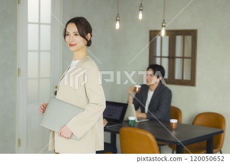 Young woman in a suit 120050652