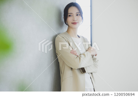 Young woman in a suit Young woman in a suit 120050694