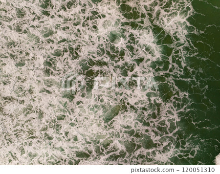 Top view sea surface waves crashing in summer season seascape background,Nature sea beach background,High angle view amazing waves,Wide angle image beach background 120051310