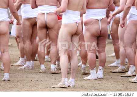 Men wearing loincloths, festival scene 120051627