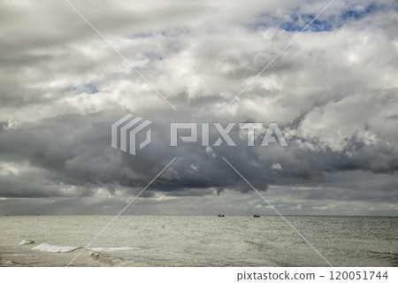 Stormy weather Fishing boats in the horizon 120051744