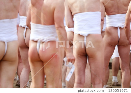 Men wearing loincloths, festival scene 120051971