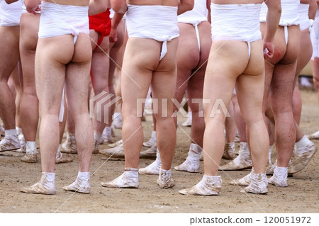 Men wearing loincloths, festival scene 120051972