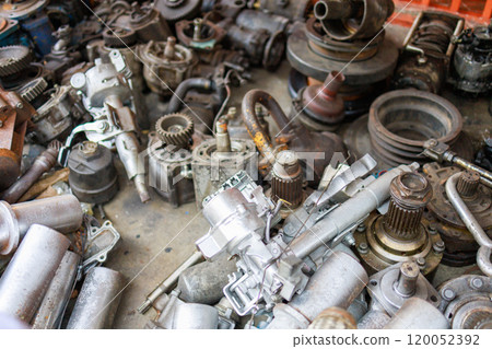 View of Old engine parts decoration, focus selective View of Old engine parts decoration, focus selective 120052392