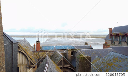 Rooftop view from Mont Saint-Michel, Normandy, France overlooking tidal flats Rooftop view from Mont Saint-Michel, Normandy, France overlooking tidal flats 120053705