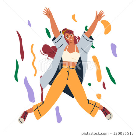 Celebration concept. A happy woman with red hair and glasses, in casual attire, jumping with raised arms among colourful confetti pieces. Ideal for Party invitations, event promotions, festive 120055513