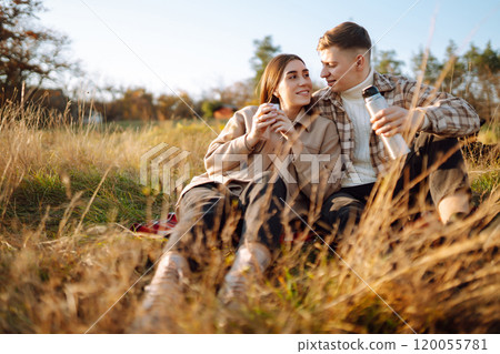 Stylish couple walking autumn weather. People, lifestyle, relaxation concept. Autumn Fashion concept 120055781
