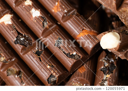 Close-up of milk nut chocolate. Healthy sweets, lactose-free and sugar-free chocolate 120055971