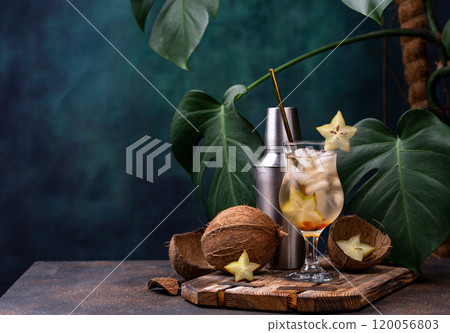 Summer Tropical cocktail with carambola 120056803