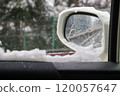 The view from inside a car on a snowy day. 120057647
