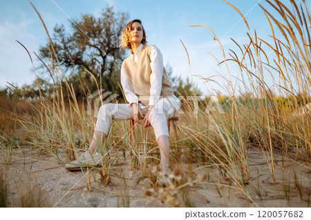 Portrait of elegant, luxury woman posing in nature. People, lifestyle, relaxation concept. 120057682