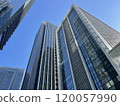 Skyscrapers towering over the blue sky 120057990