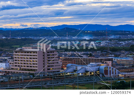 Evening view from the ruins of Shiroyamadai Castle in Kizugawa City, the southernmost part of Kyoto Prefecture - JR Kizu Station at dusk 120059374