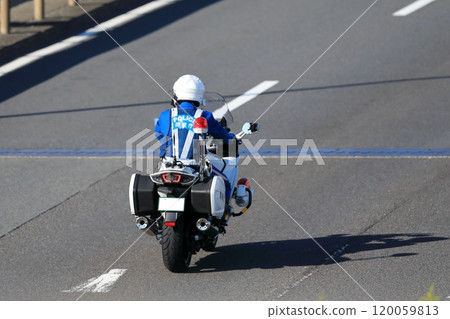 A police motorcycle on patrol 120059813