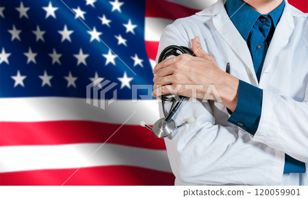 Doctor with stethoscope on USA flag. Health and care with the flag of United State. USA national health concept, Doctor arm holding stethoscope on USA flag 120059901