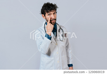 Male doctor making gesture of watching you. Doctor making gesture of watching you. Concept of doctor with surveillance gesture Male doctor making gesture of watching you. Doctor making gesture of watching you. Concept of doctor with surveillance gesture 120060019