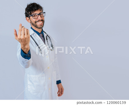 Smiling doctor inviting to come isolated. Young friendly doctor inviting to come on isolated background 120060139