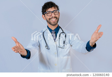 Doctor smiling with open arms welcoming. Friendly doctor hugging the camera. Medical friendship concept 120060140