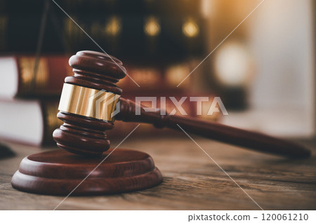 Law theme, mallet of the judge, law enforcement officers, evidence-based cases, and documents taken into account. 120061210