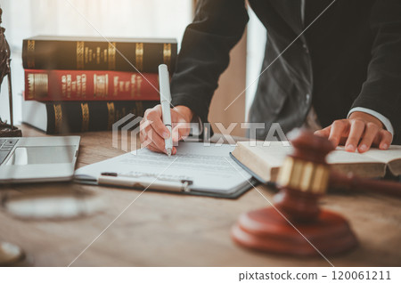 Law theme, mallet of the judge, law enforcement officers, evidence-based cases and documents taken into account. 120061211