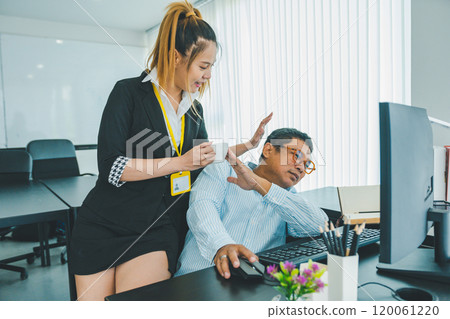 Young female employee seducing boss or supervisor at work Make your boss uncomfortable and afraid of sexual abuse. Concept of sexual harassment in the workplace 120061220