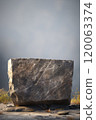 A rock blow, large square stone pedestal, a boulder in a natural background. Flat Rock Stone Outdoors, Pedestal for Eco Products and Natural Cosmetics 120063374