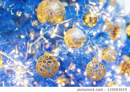 Blurred background golden glitter shiny sparkling banner. Happy Holidays background for template on christmas card brochures posters. Gold bokeh template for digital presentation slideshow background 120063659