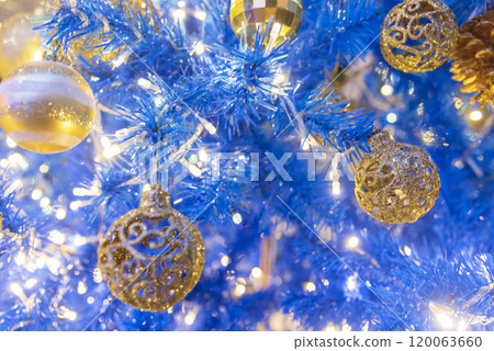 Golden Christmas Ornament sparkling blurred background. Golden glitter shiny illuminated Christmas Lights banner. Happy Holidays background for template on christmas card Gold bokeh presentation. Golden Christmas Ornament sparkling blurred background. Golden glitter shiny illuminated Christmas Lights banner. Happy Holidays background for template on christmas card Gold bokeh presentation. 120063660