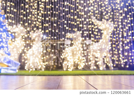 Golden Christmas Ornament sparkling blurred background. Golden glitter shiny illuminated Christmas Lights banner. Happy Holidays background for template on christmas card Gold bokeh presentation. Golden Christmas Ornament sparkling blurred background. Golden glitter shiny illuminated Christmas Lights banner. Happy Holidays background for template on christmas card Gold bokeh presentation. 120063661