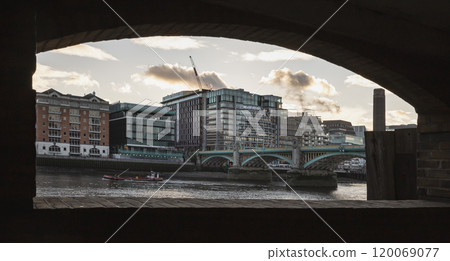 View of Southwark Bridge cross The River Thames with Modern buildings in the background. View of Southwark Bridge cross The River Thames with Modern buildings in the background. 120069077