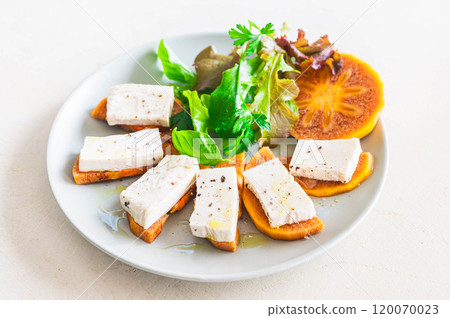 Persimmon and tofu cheese caprese style Persimmon and tofu cheese caprese style 120070023