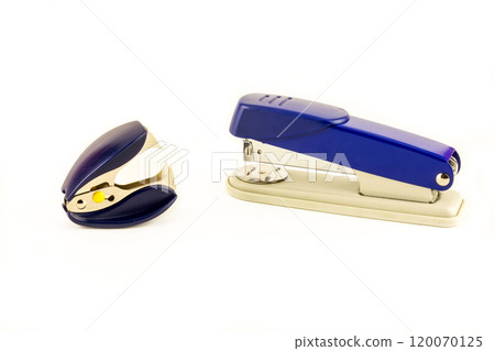 Stapler and anti-stapler lie on white background. A stapler and anti-stapler lie on a white background 120070125