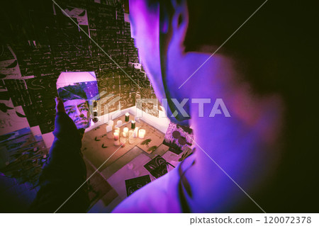 Man, mirror and mask with serial killer at night with mental illness for halloween, fantasy or reflection at home. Male person, disguise and broken glass with psychopath hiding identity in dark room 120072378
