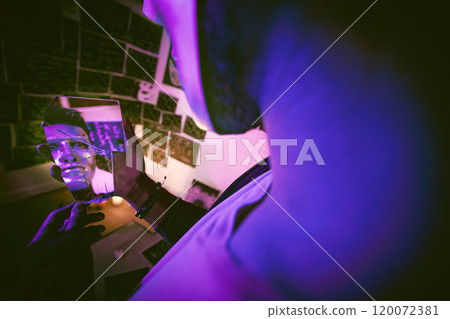 Man, mirror and mask with reflection at night of serial killer with mental illness for halloween, fantasy or bipolar at home. Male person, disguise and broken glass with psychopath hiding identity 120072381