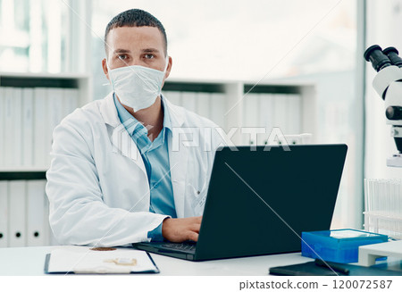Well find a cure, whatever it takes. Portrait of a young scientist using a laptop while working on a coronavirus cure in a laboratory. Well find a cure, whatever it takes. Portrait of a young scientist using a laptop while working on a coronavirus cure in a laboratory. 120072587